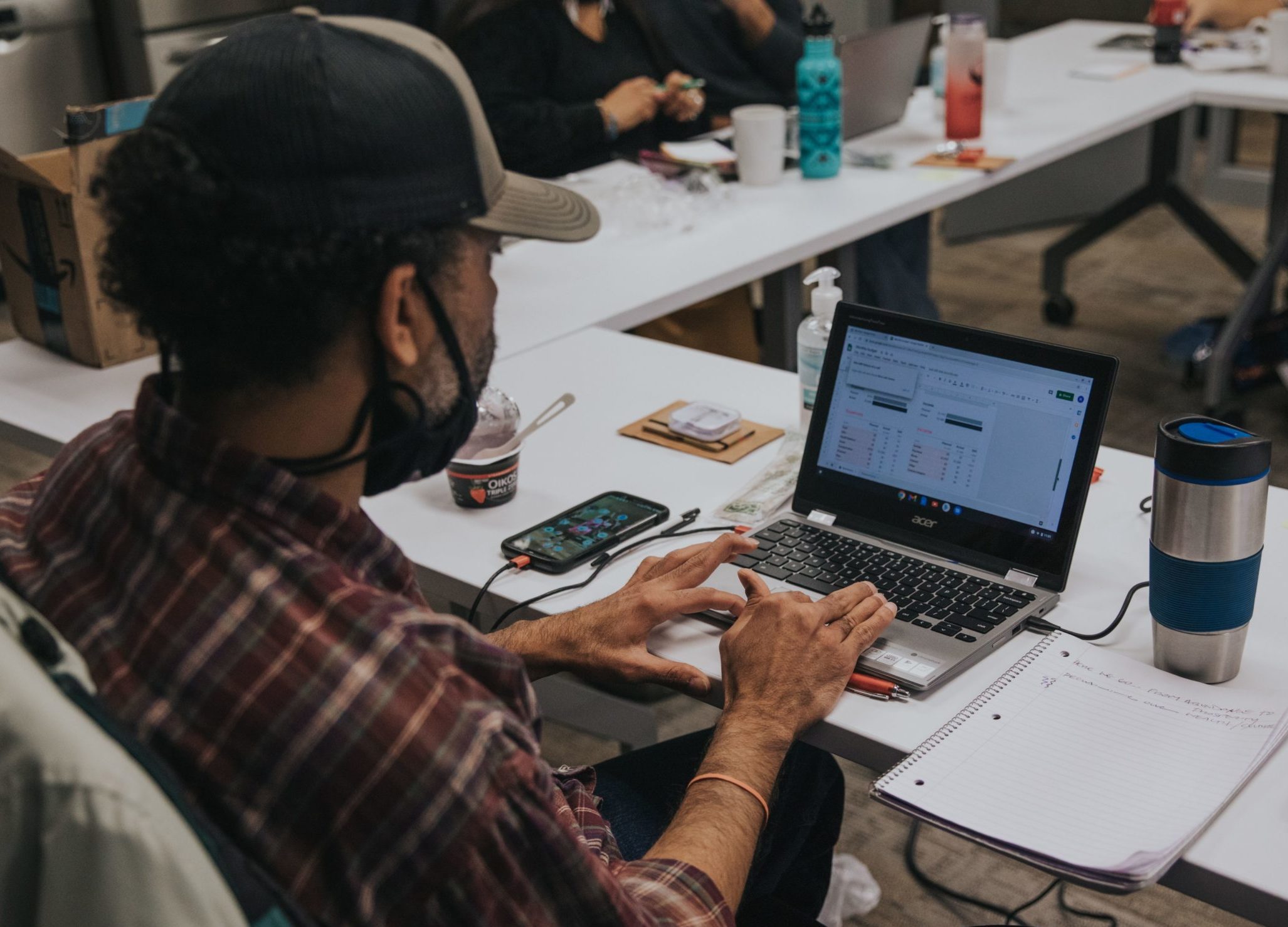 Robin Kissinger reviews a sample budget during the FBB program in Traverse City 