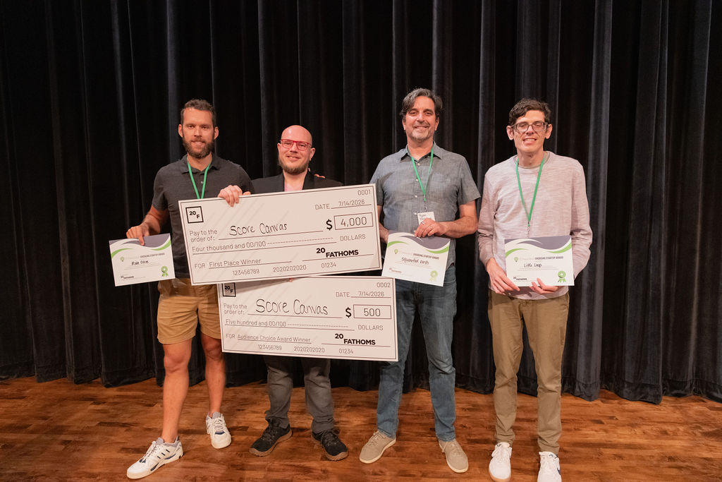 July TCNewTech winners hold their awards.